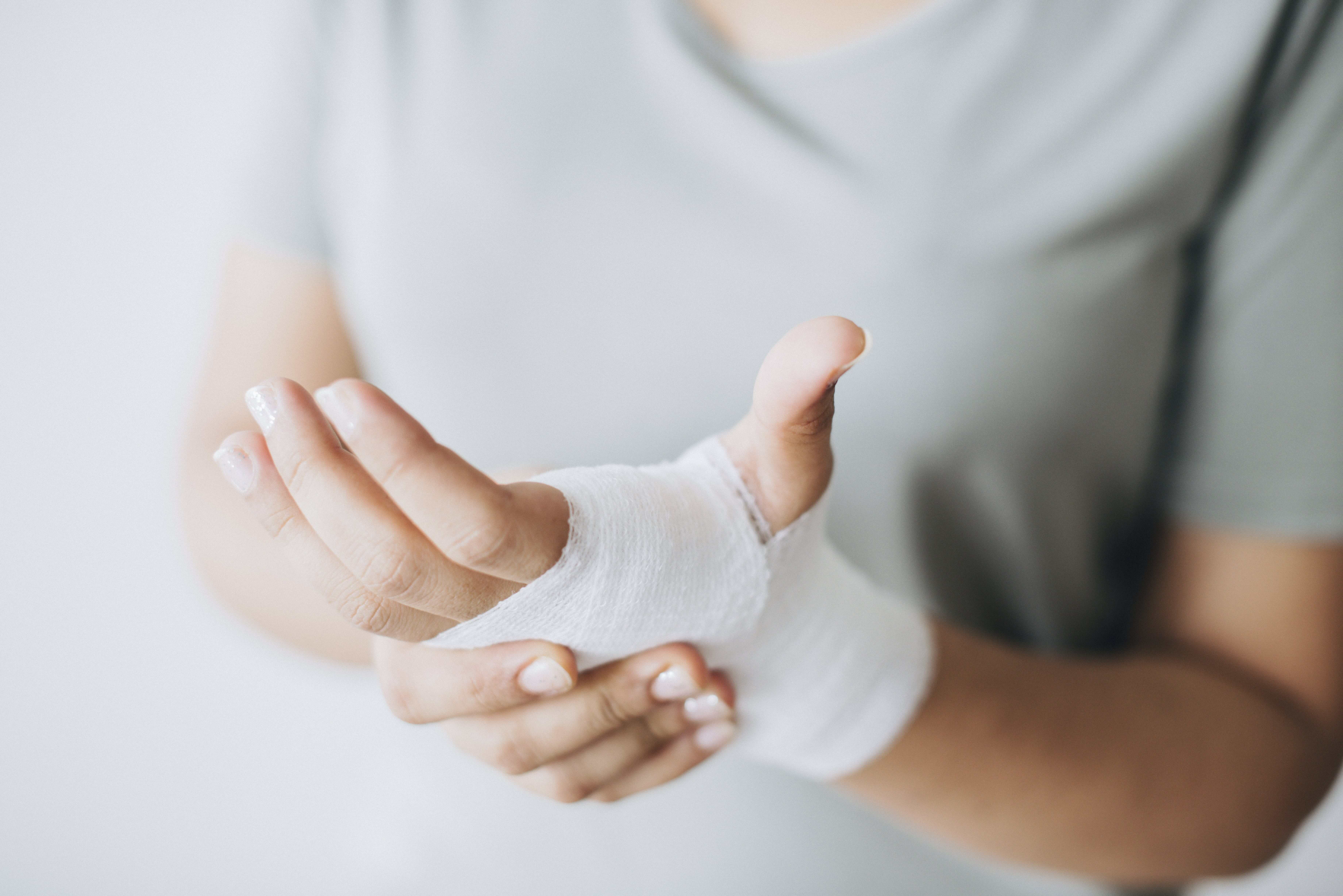 woman-with-gauze-bandage-wrapped-around-her-hand-min(1)